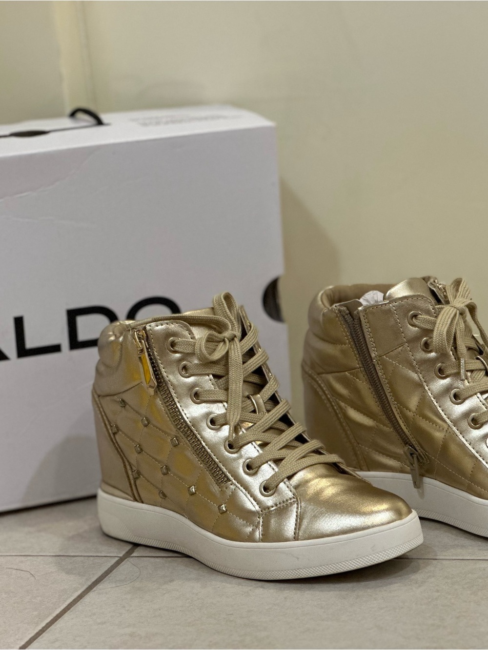 Aldo Metallic Gold Wedge Sneakers